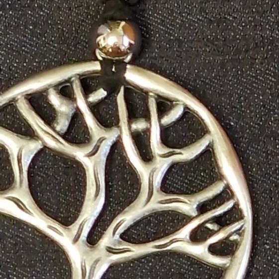 Albero della vita e cordino scamosciato.